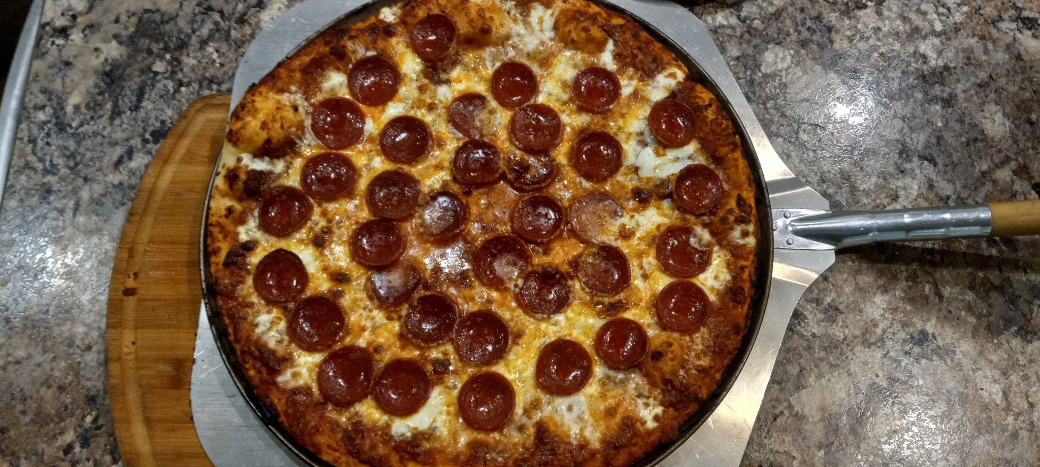 Phone photo of pepperoni pan pizza before editing